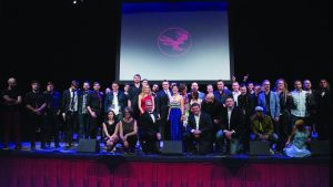 ￼BIG BALL IN AUSTIN TOWN: The Black Fret family of nominees, mentors and founders onstage at the Paramount Theater. (Photo by Dave Pedley)